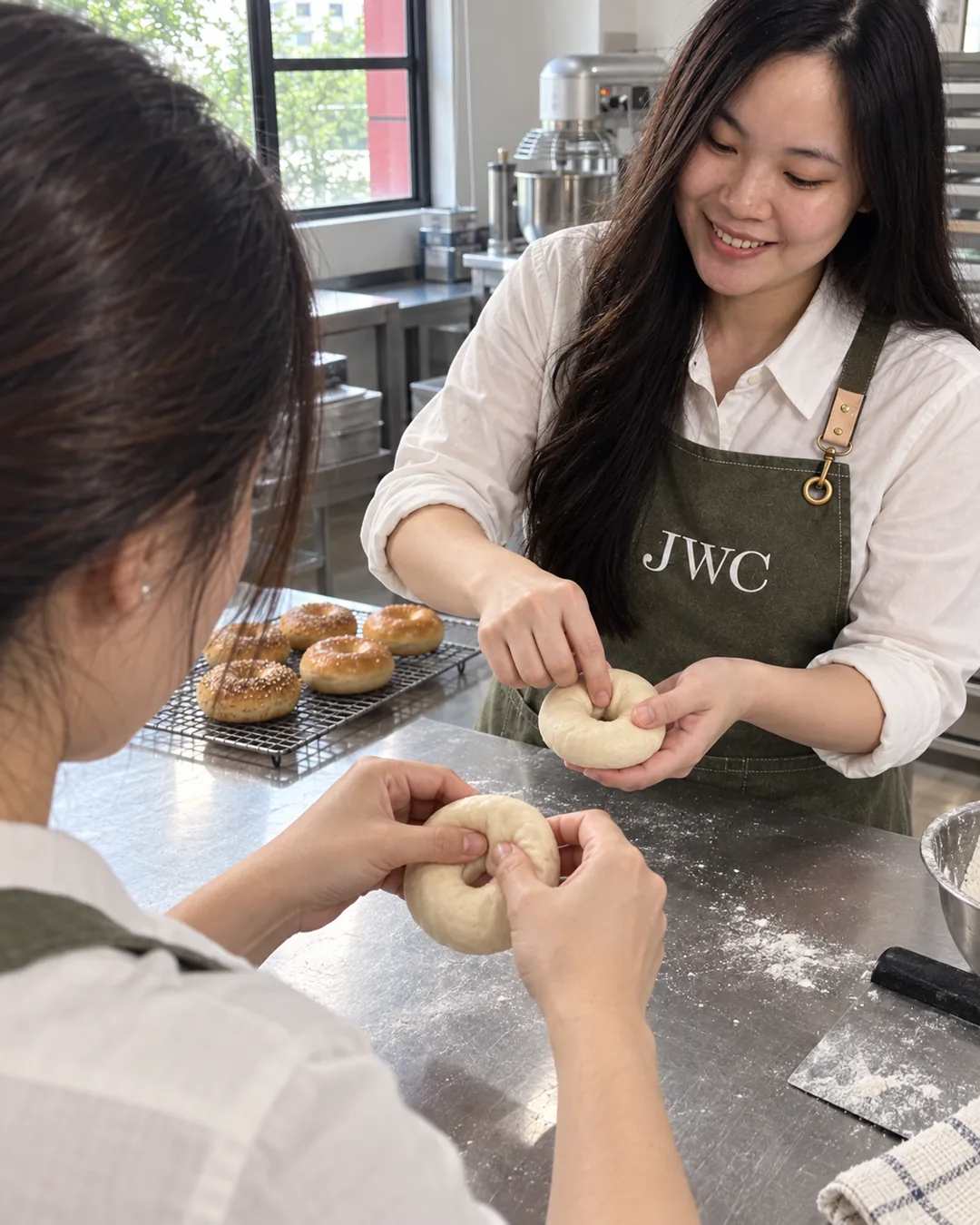 Siew Wei demonstrating bagel shaping from a learner's viewpoint